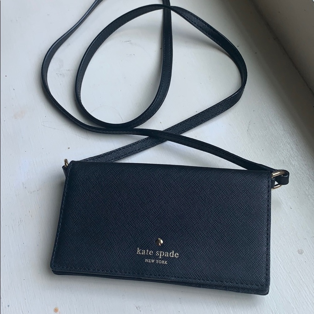 Kate Spade leather phone purse, unused condition.